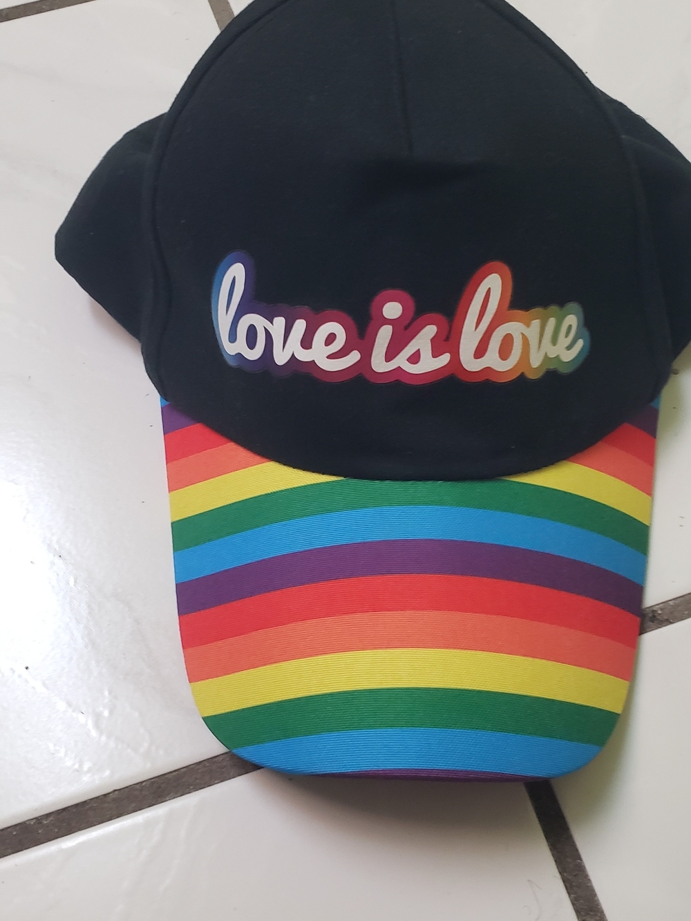 Brand new "Celebrate It"  black Baseball Cap with Rainbow Brim